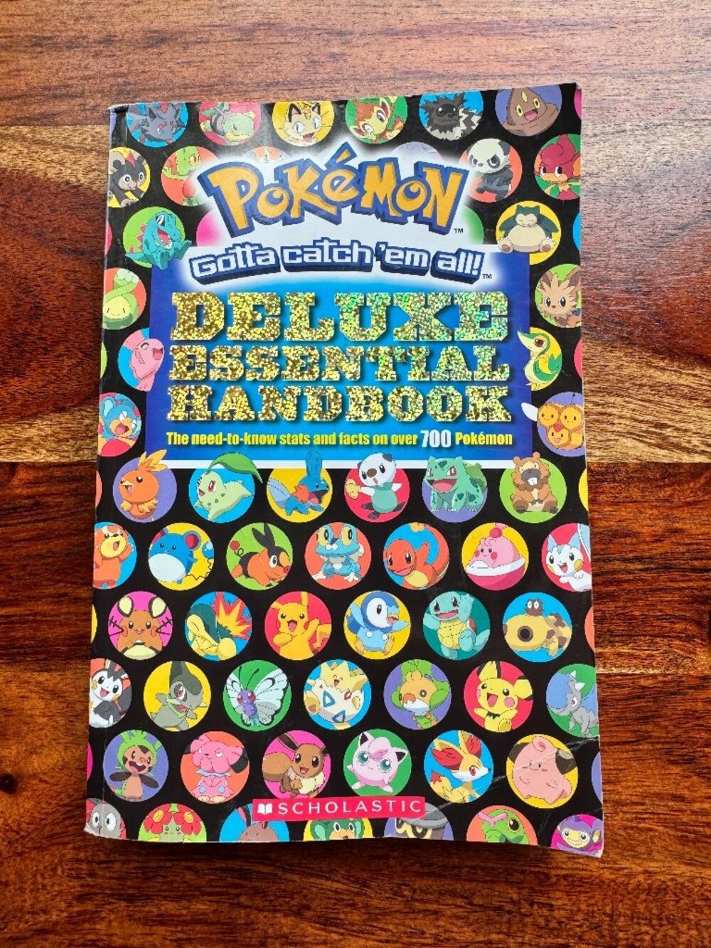 Pokemon Deluxe Essential Handbook – Scholastic 2015 Paperback